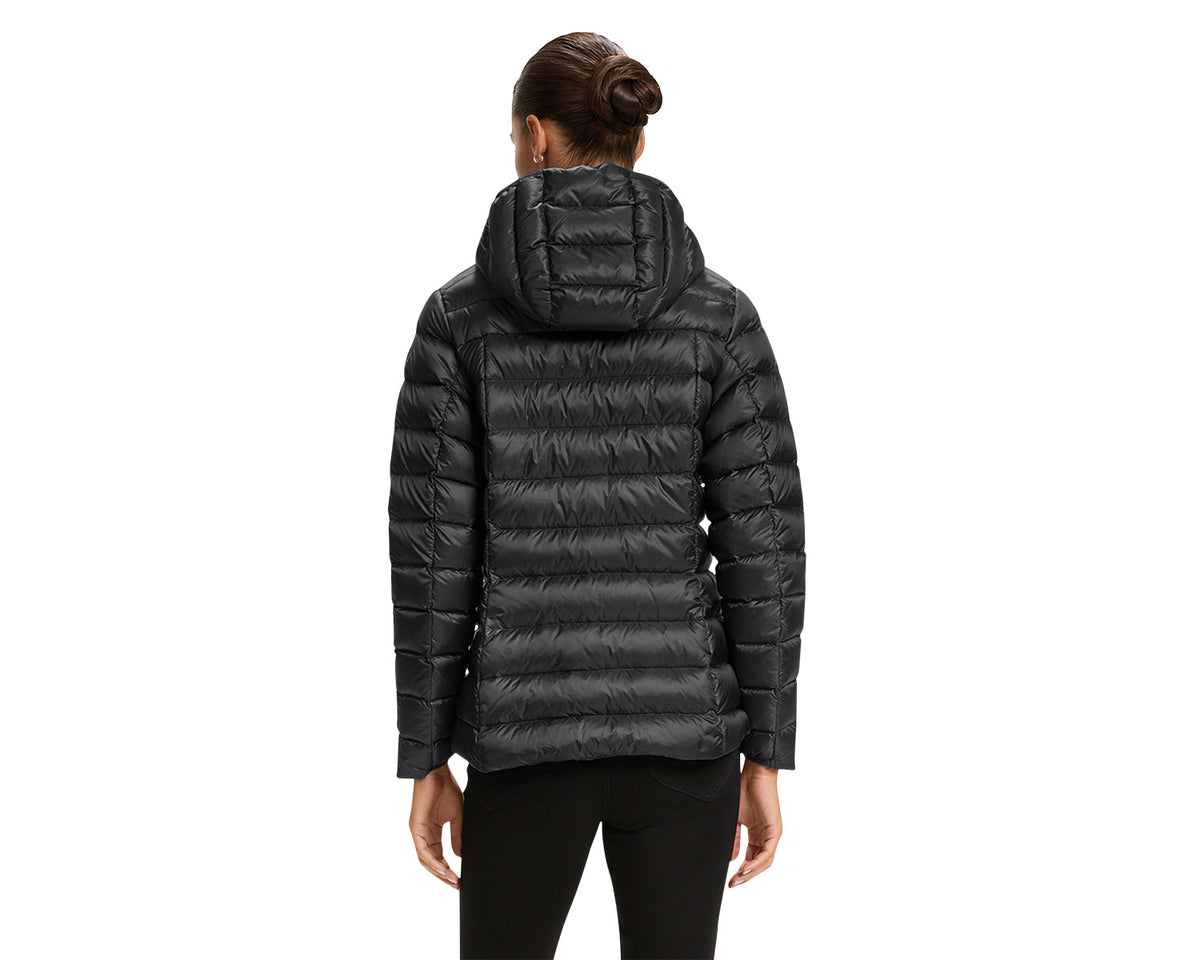 Person wearing a black puffer jacket on a white background
