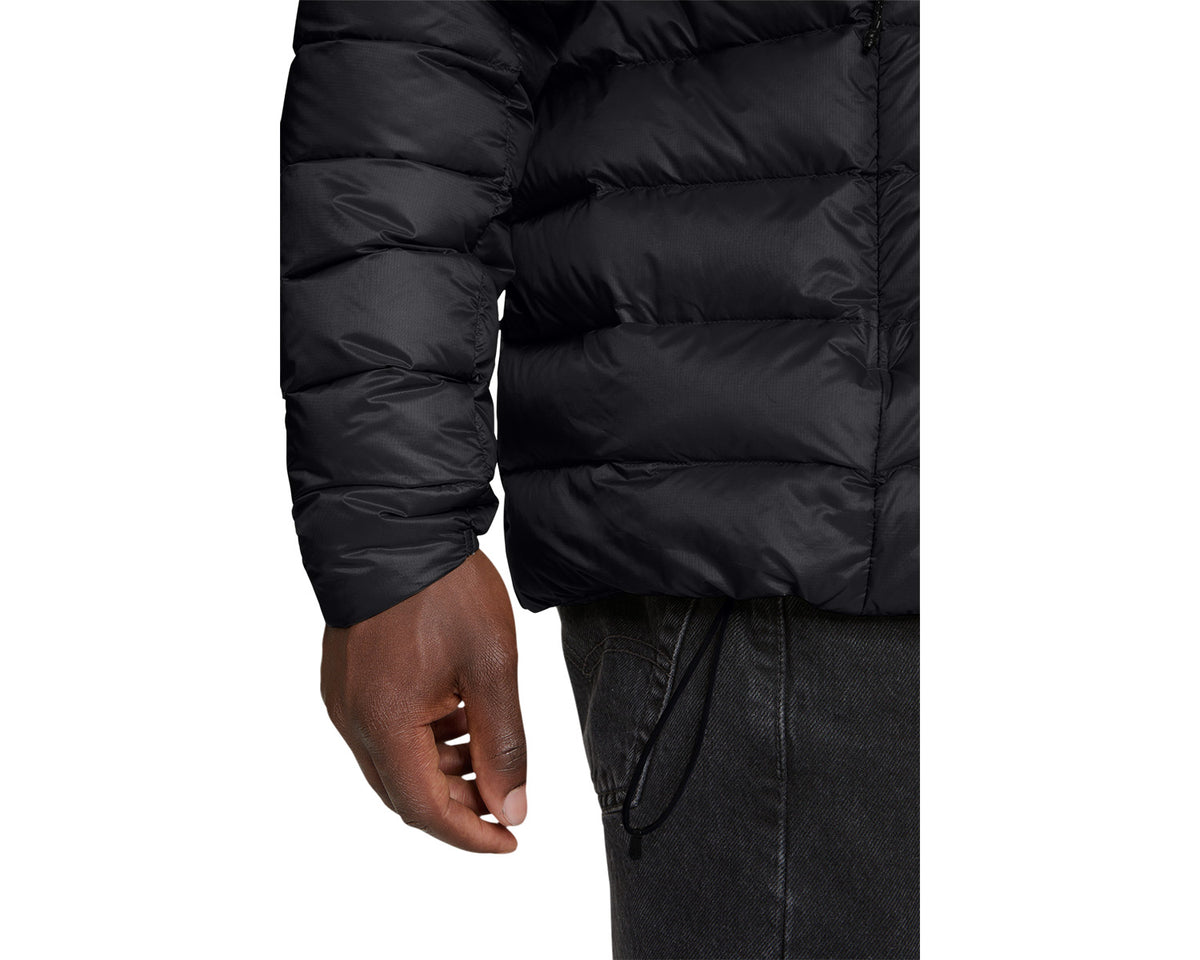 Black puffer jacket with a person wearing it on a white background