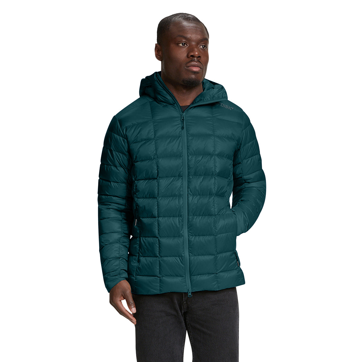 A man wearing a dark teal green hooded puffer jacket, shown from the waist up against a plain white background.