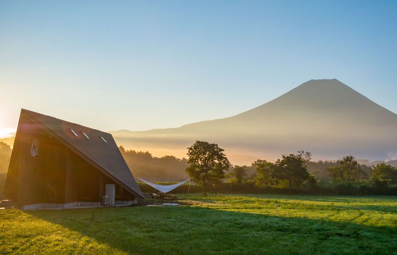Nordisk glamping site in Japan featuring a modern cabin with a view of Mount Fuji.