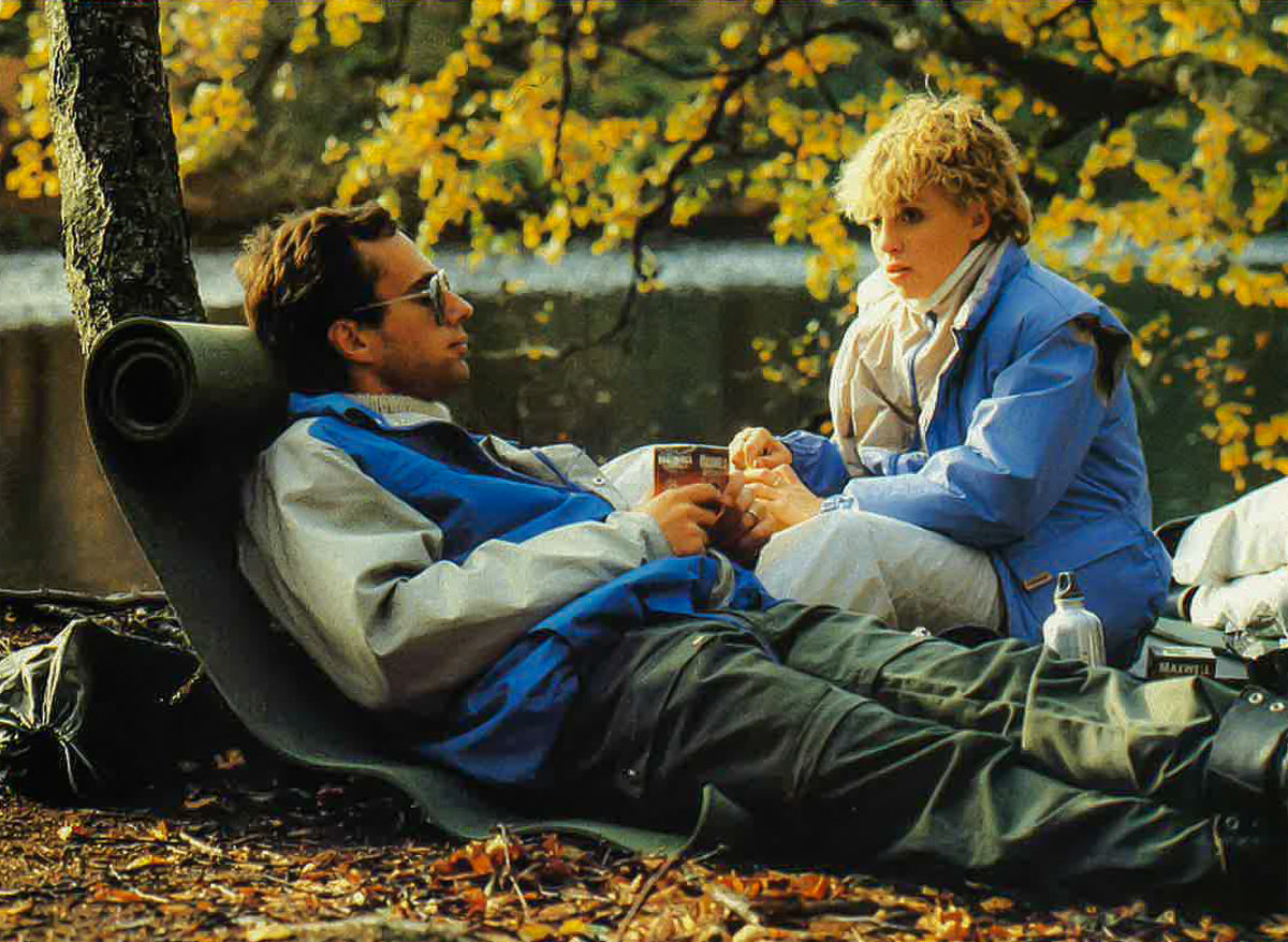 Vintage outdoor scene featuring two adventurers with retro camping gear during Nordisk 125 year anniversary.