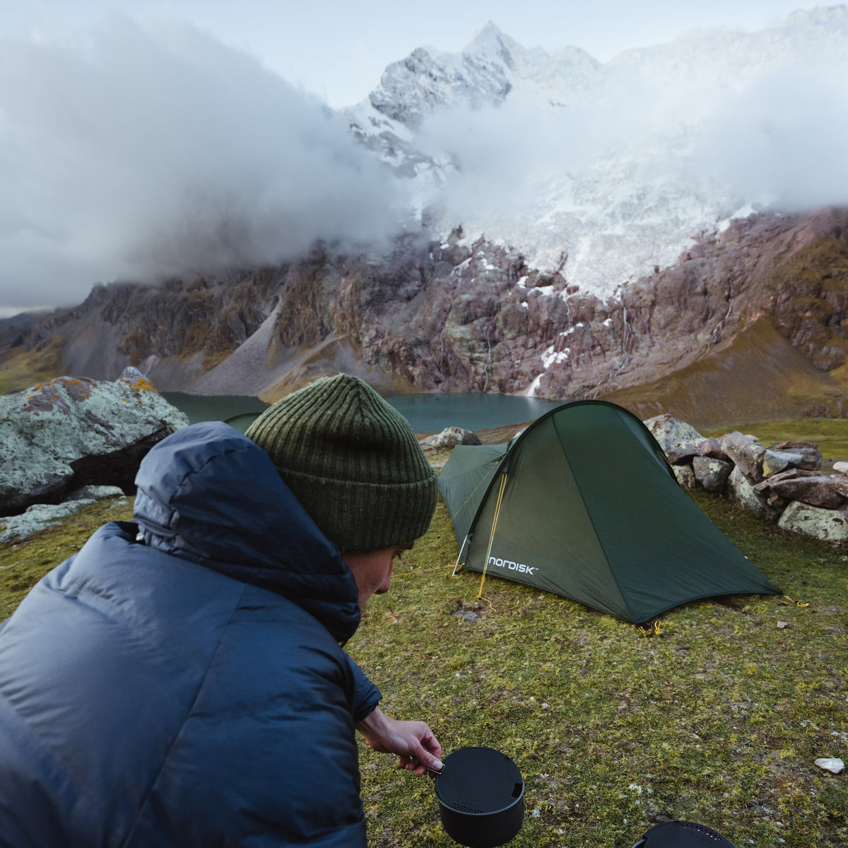Wild camping with a Nordisk tent and outdoor cooking gear in the Peruvian mountains.