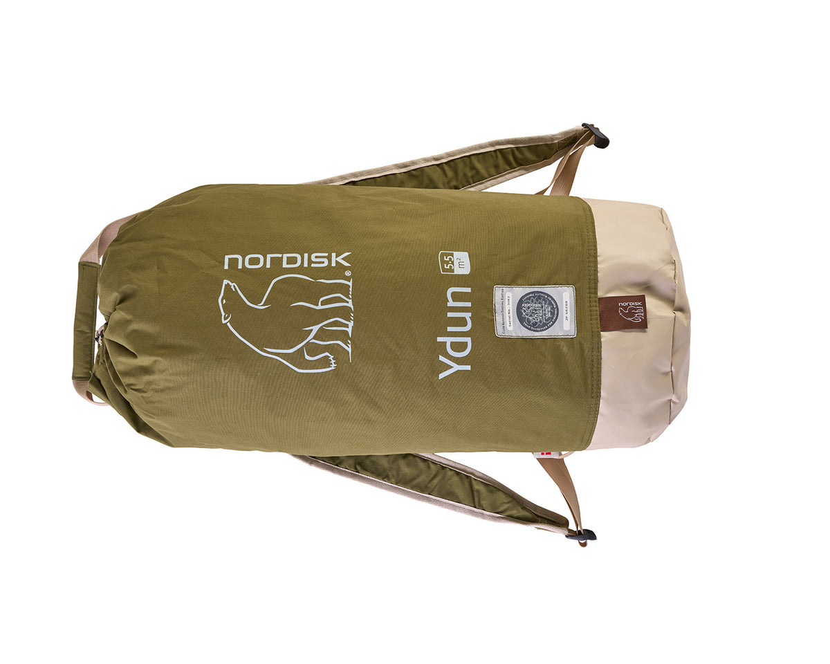 Green and beige sleeping bag with Nordisk and Ydun branding on a white background