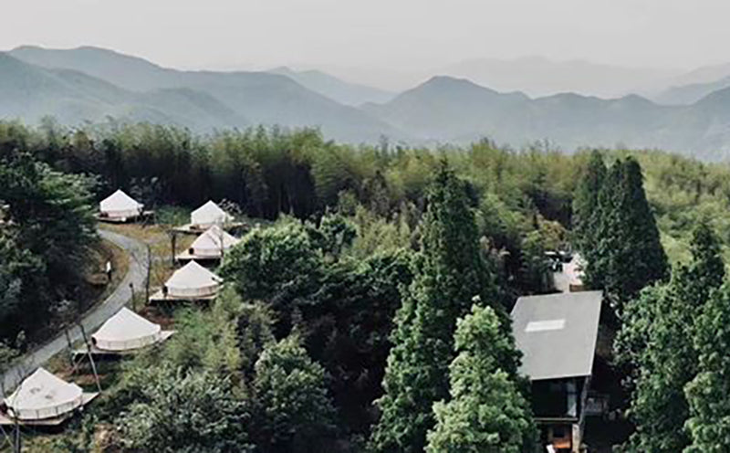 Luxury glamping tents at Refuge Moganshan in the scenic mountains of China.