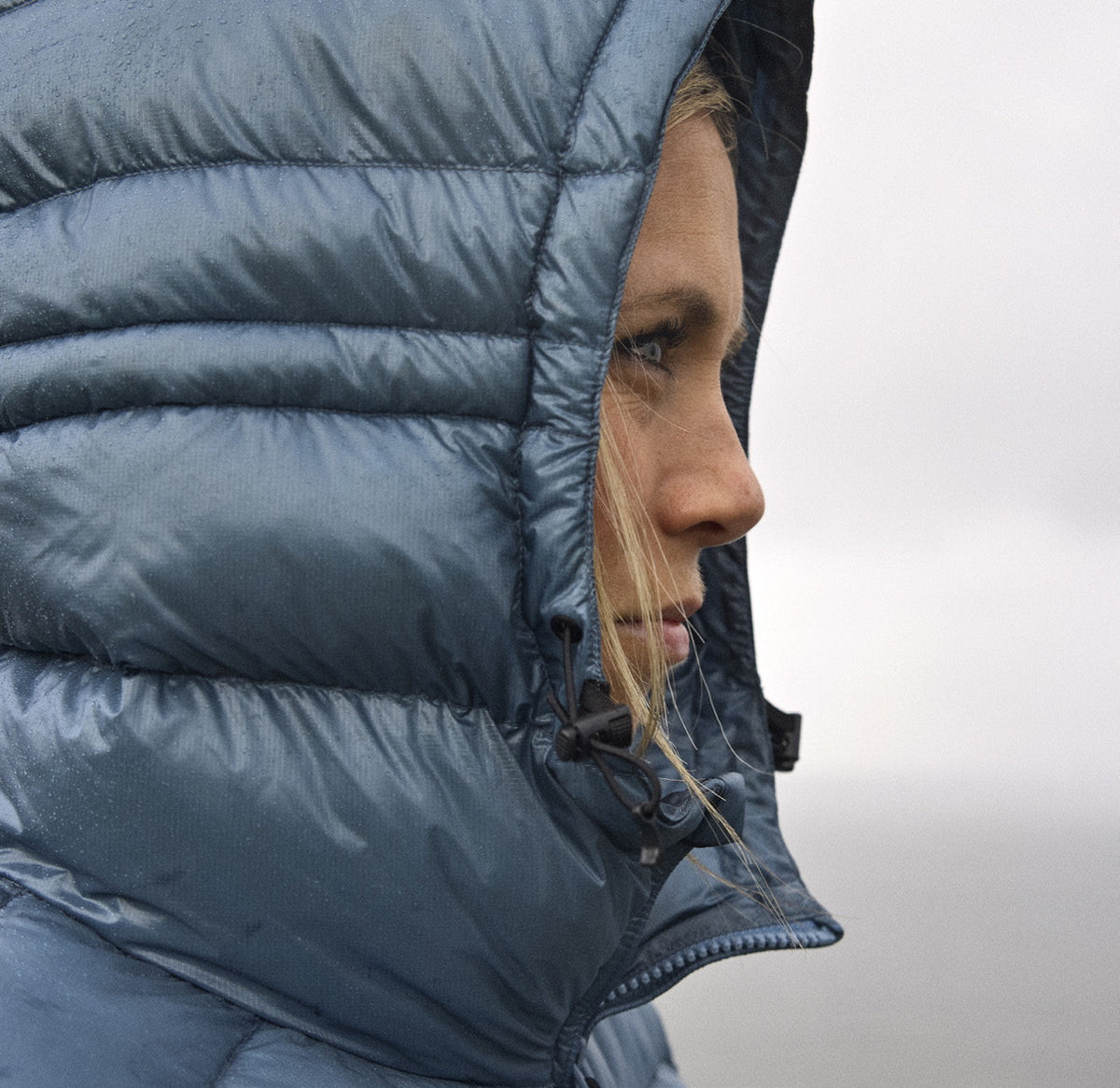 Close-up of the hood on the Companyon Dagmar down coat in Blue Mirage